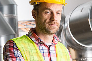 Ambient Engineering engineer wearing hard-hat and hi-vis vest