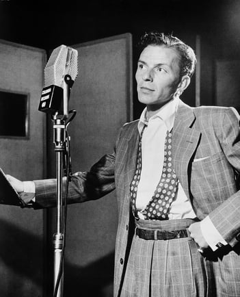 Frank Sinatra younger standing at microphone